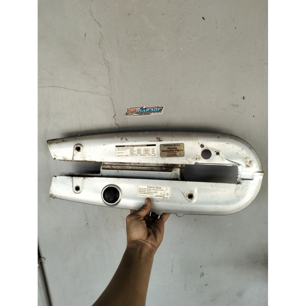 Katengkas tutup rantai Honda Kirana 125 kpw original copotan