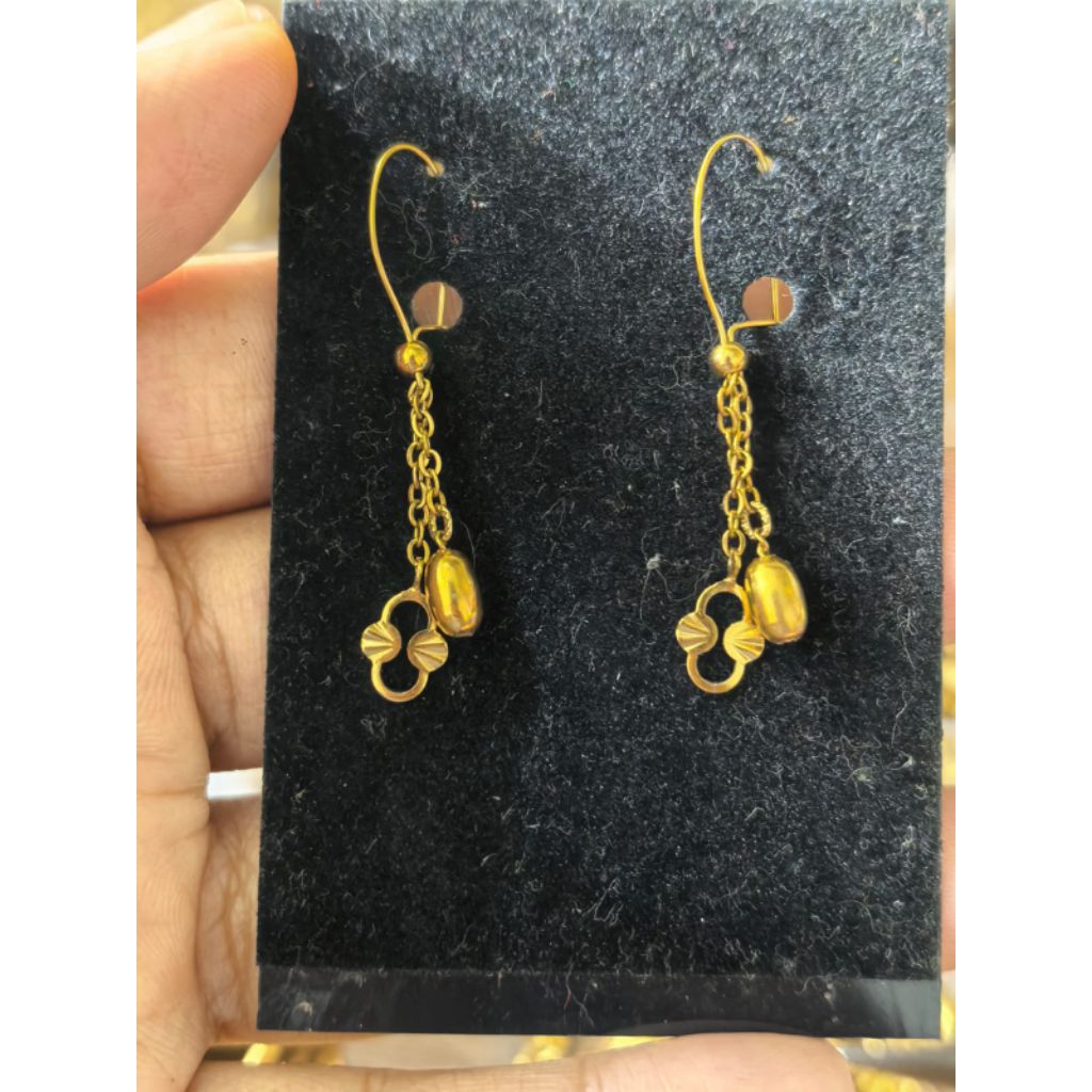 Anting titanium asli