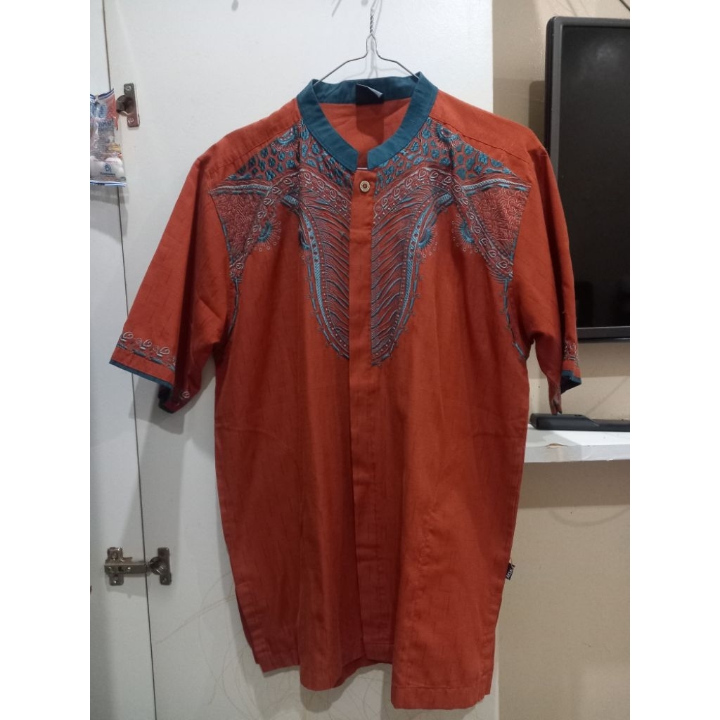 koko bordir merah bata