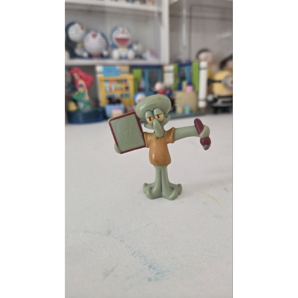 Preloved Squidward pelukis