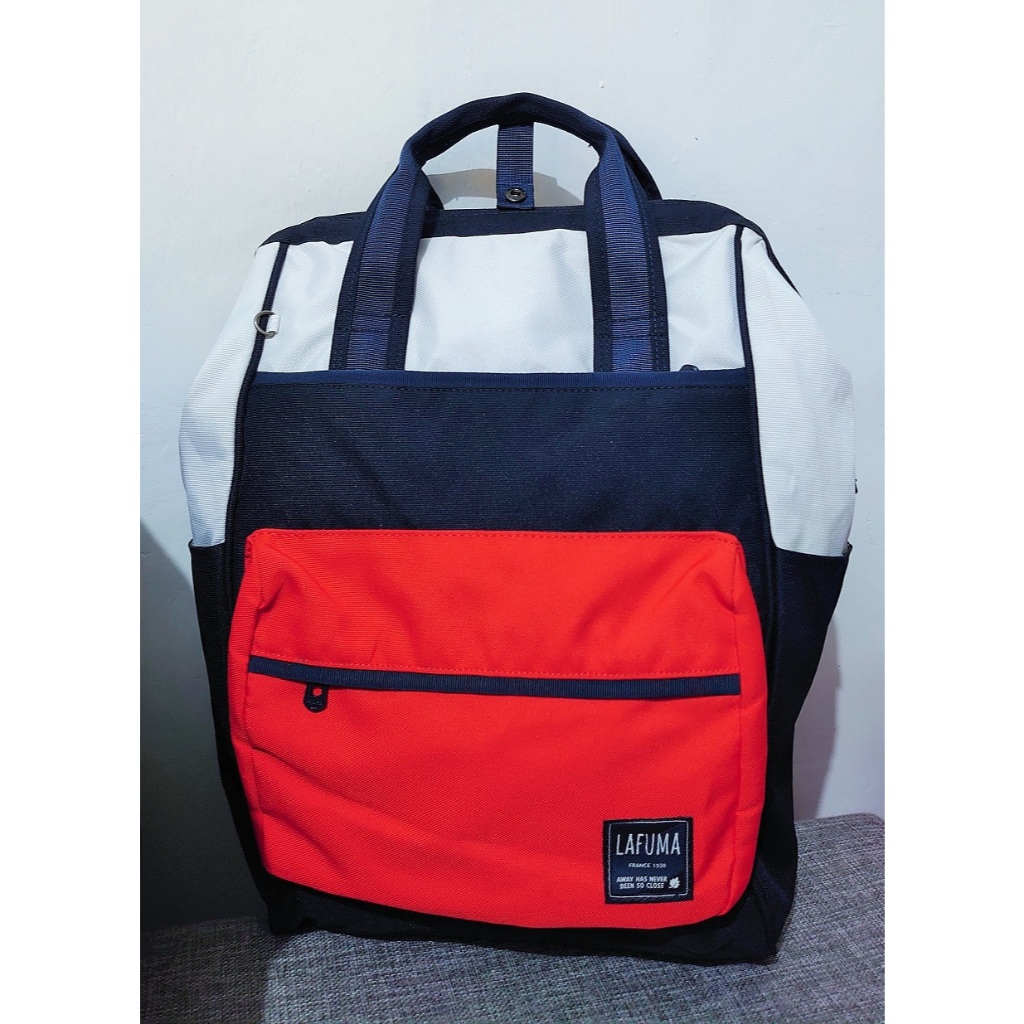 Ransel Lafuma Kombinasi Putih Biru Merah Dengan Kantong Depan Dan Pegangan Tangan