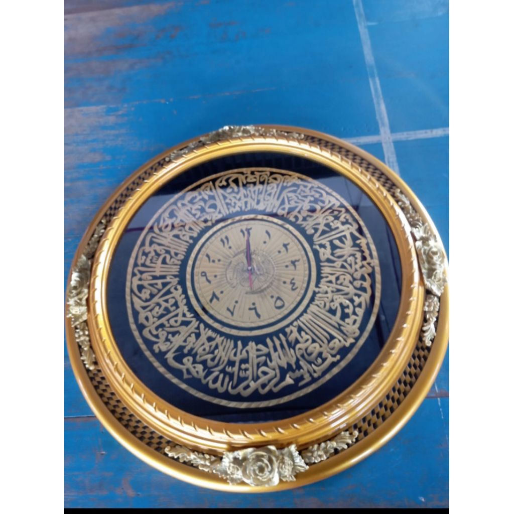 jam dinding kaligrafi ukir
