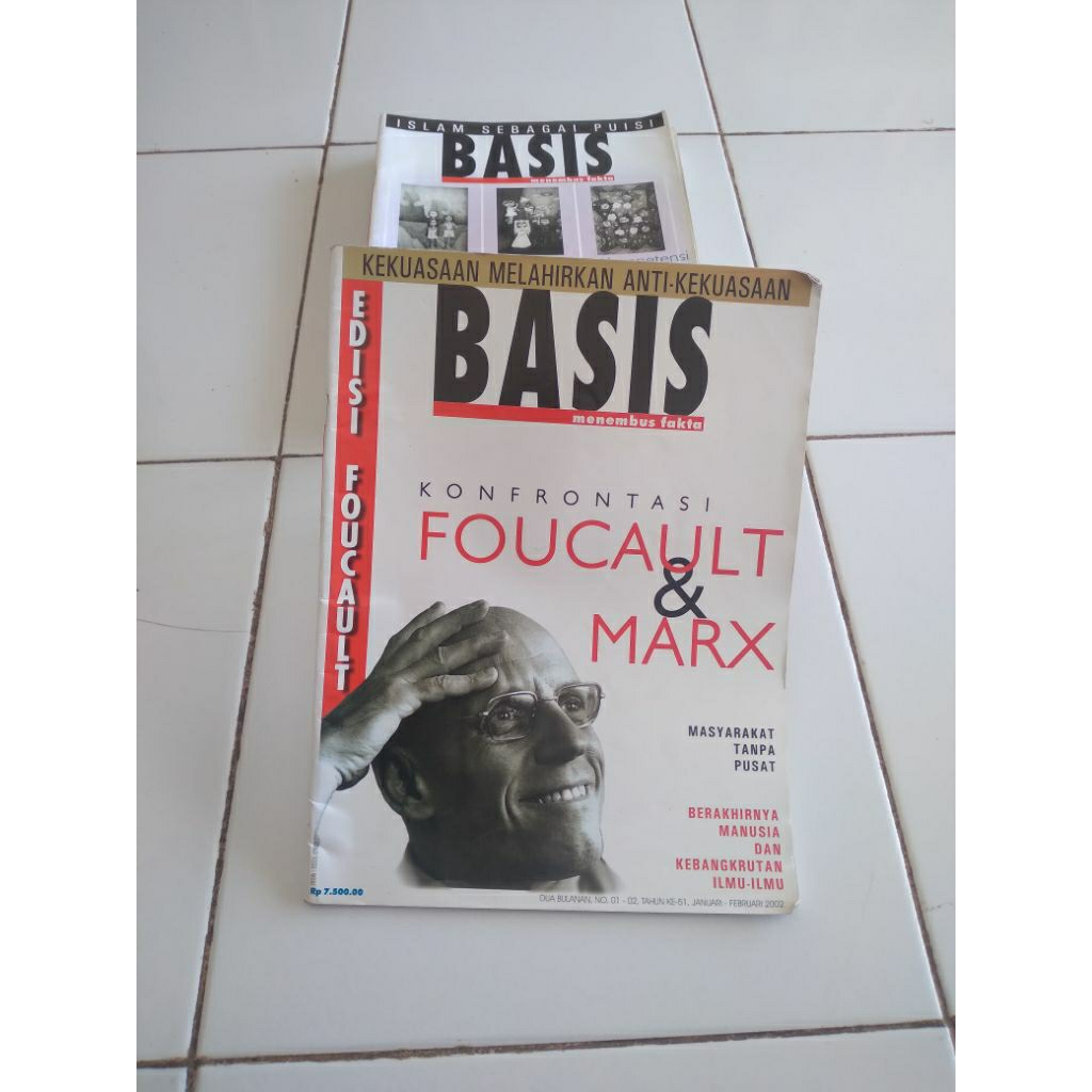konfrontasi foucault dan marx