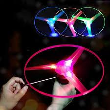 Mainan Anak Gangsing Gasing Baling Baling UFO Terbang Lampu LED Tarik / Mainan Piring Terbang Tarik 