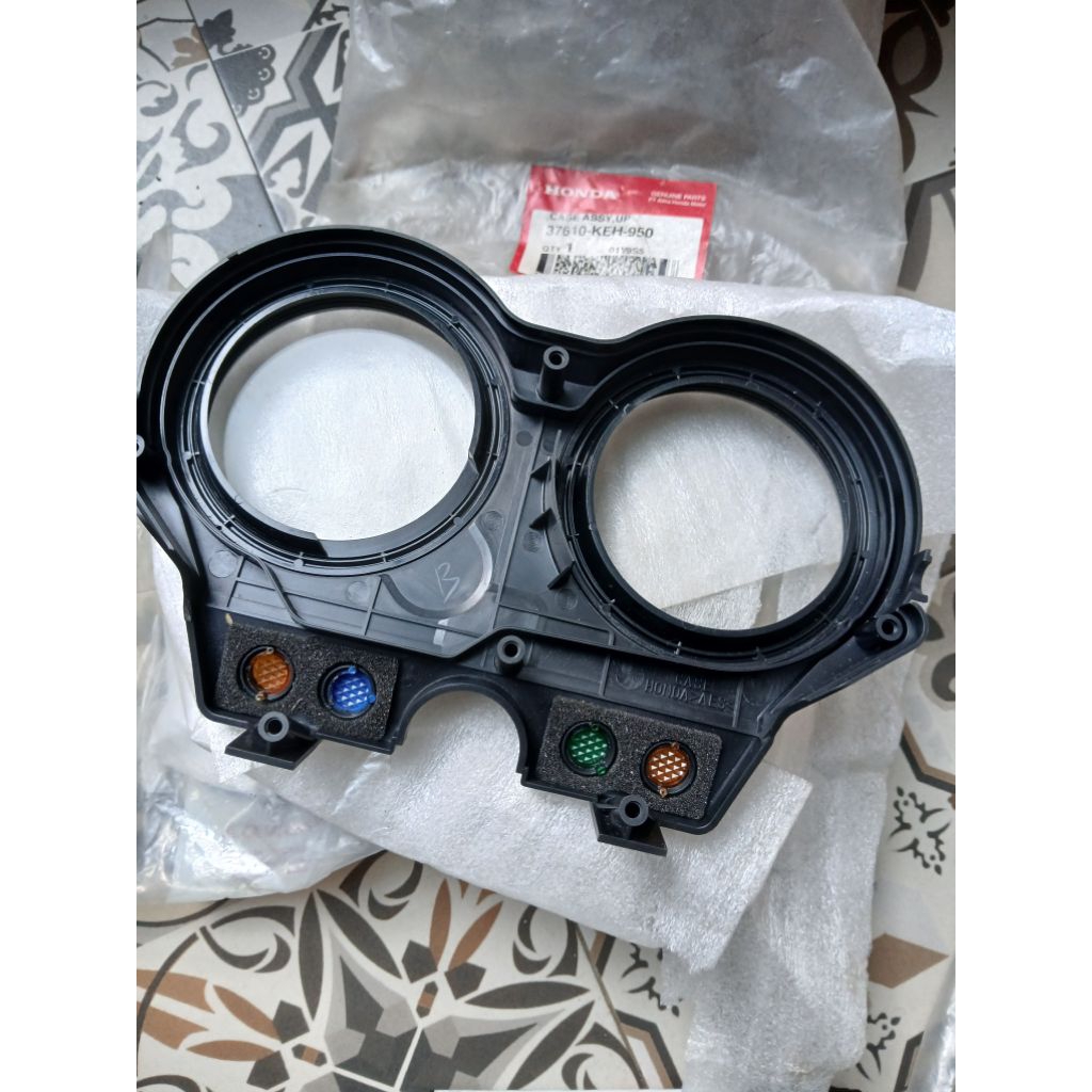 COVER SPEEDOMETER MEGAPRO LAMA HIU ORI AHM 37610 KEH 950