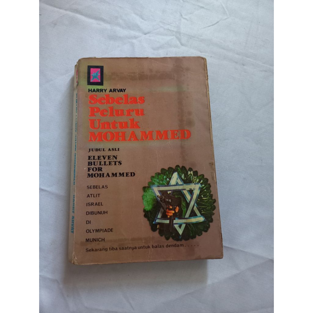 BUKU SEBELAS PELURU UNTUK MOHAMMED