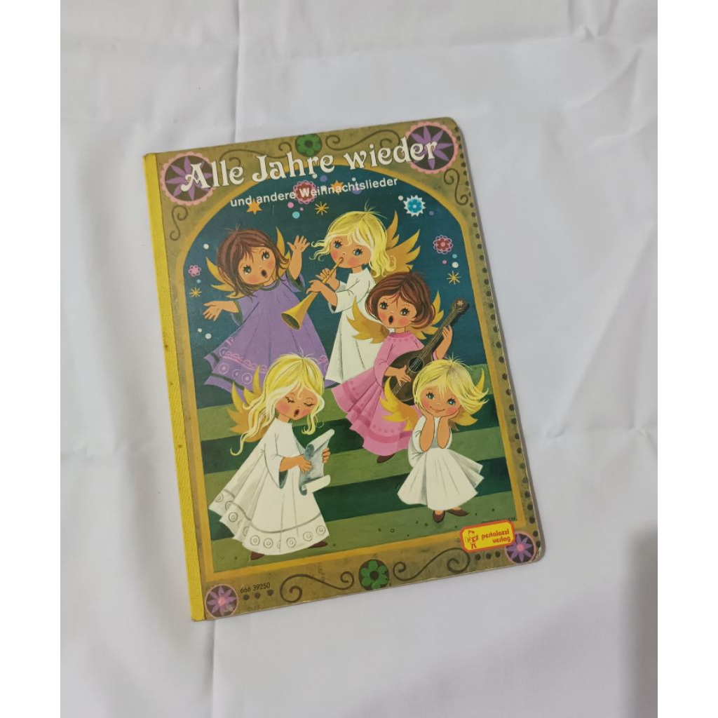 Buku lagu natal anak-anak dalam bahasa Jerman " Alle Jahre wieder und andere Weihnachtslieder " 1980