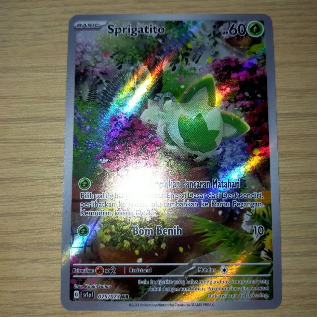 kartu pokemon sprigatito ar sv1a 075 / 073 hantaman triplet TCG indonesia kondisi di kiri atas pojok