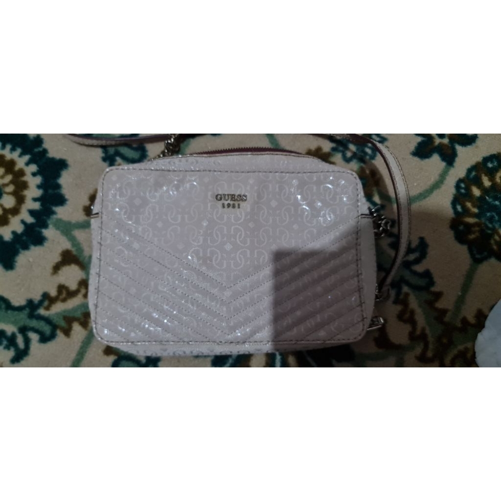 Guess sling mini bag sale preloved
