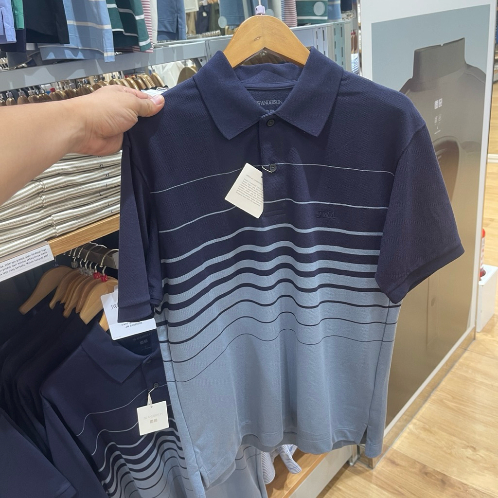 Polo Uniqlo Man JWA dry pique garis 69 navy