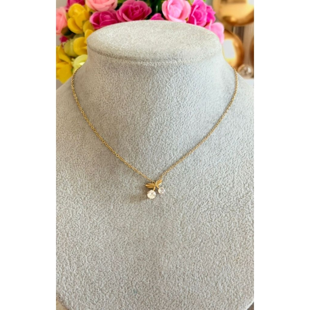 Kalung titanium set liontin ceri putih