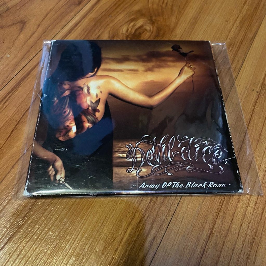 CD devil dice - army of the black rose ( jrx superman is dead )