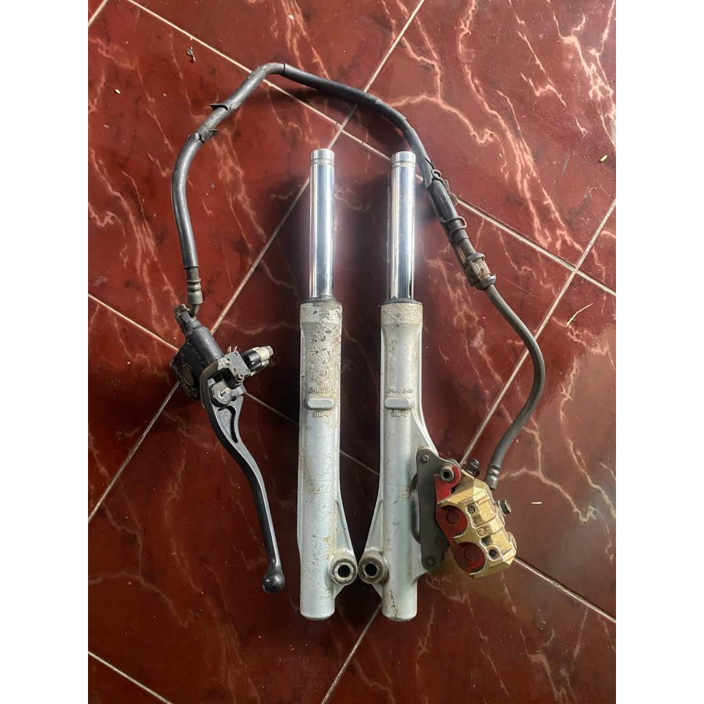 shock depan copotan supra X 125 original