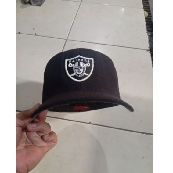 Topi Raider Reebok NFL Size 7 5/8 minus Hole