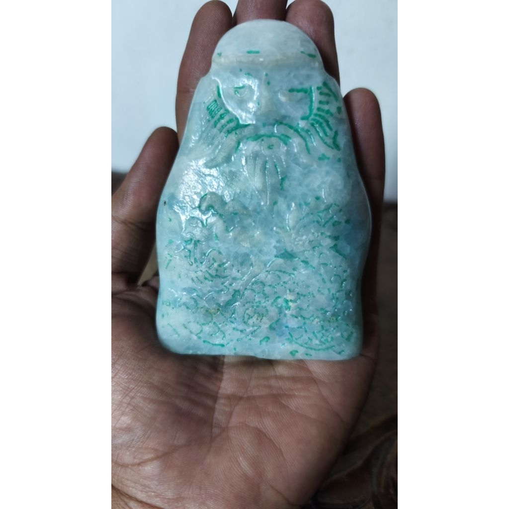 Patung Batu Dewa Kekayaan