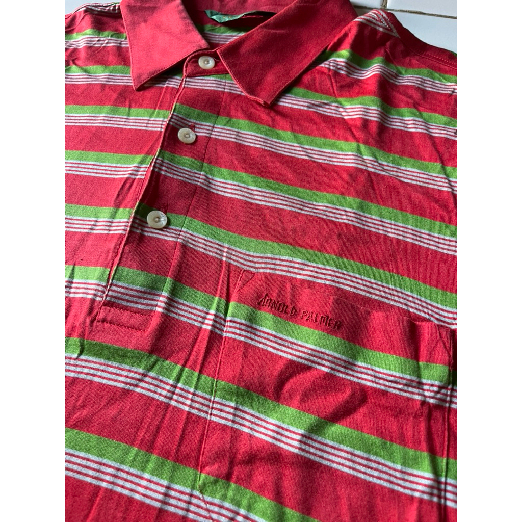 Polo salur merah Arnold Palmer
