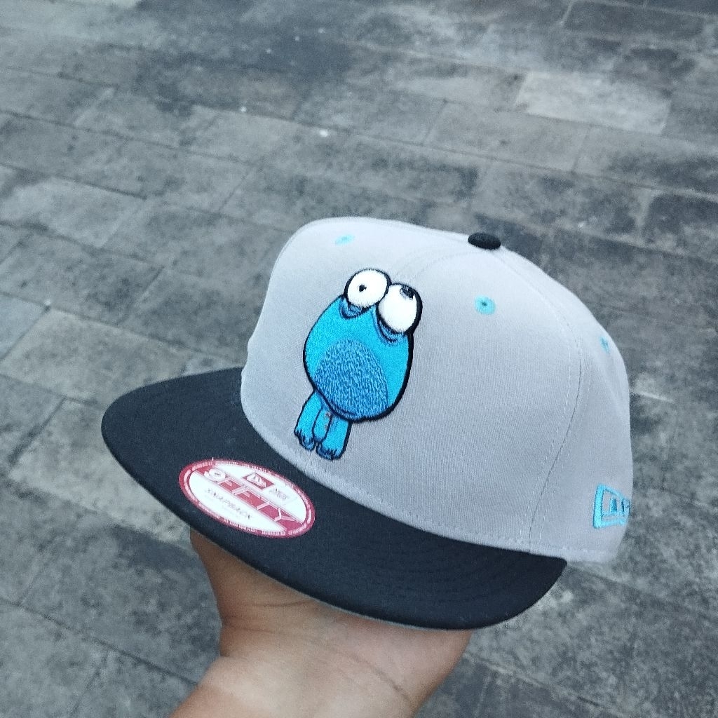 Topi snapback COOKIE MONSTER SESAME STREET X NEW ERA 9FIFTY ORIGINAL