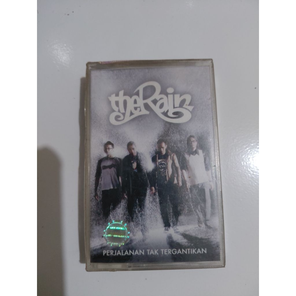 Kaset Original The Rain - Perjalanan Tak Tergantikan - Segel