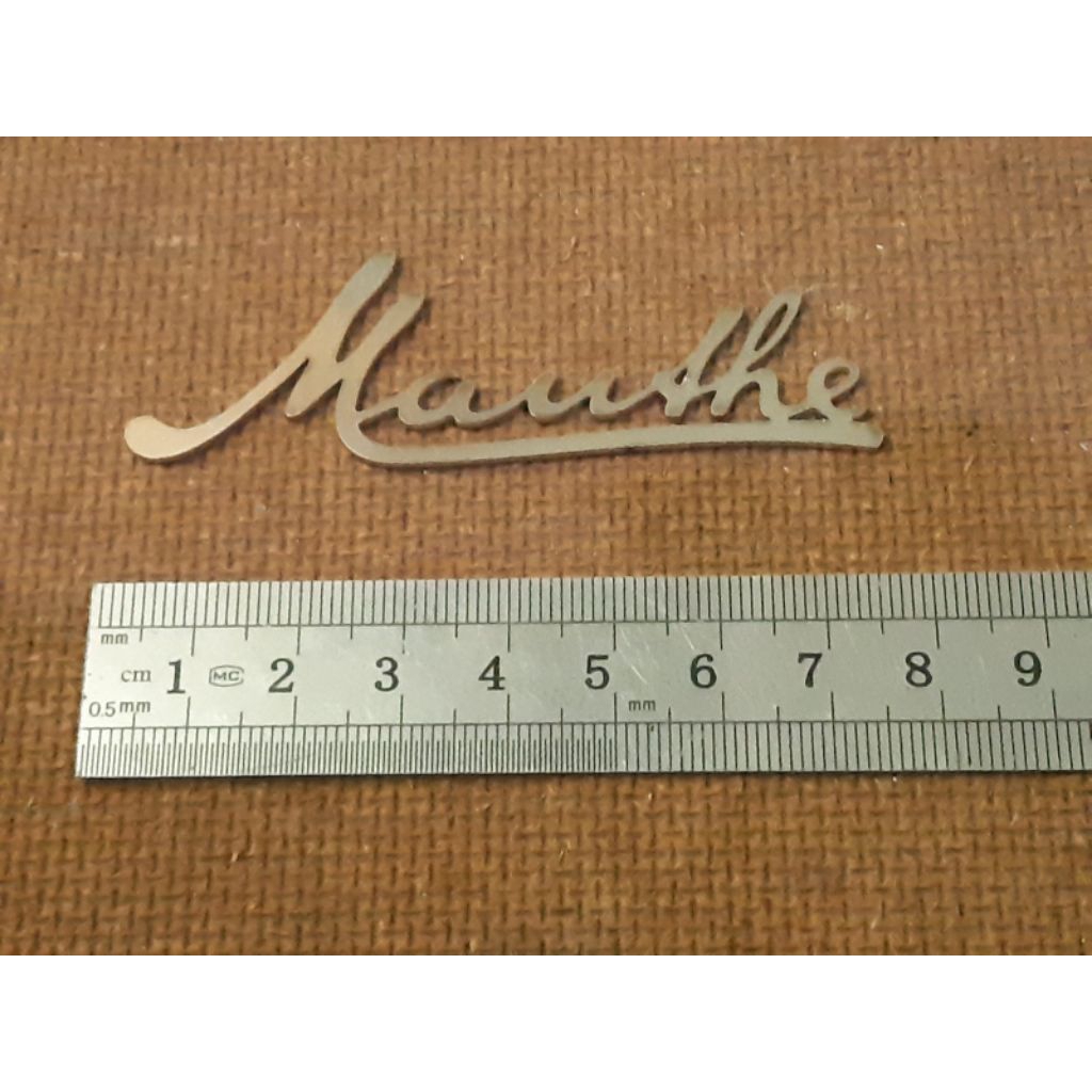 Emblem Logo warna chrome Merek Mauthe