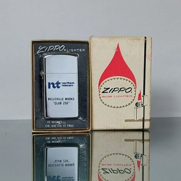 ZIPPO SLIM VINTAGE TAHUN 1976 ADVERTISING NORTHERN TELECOM