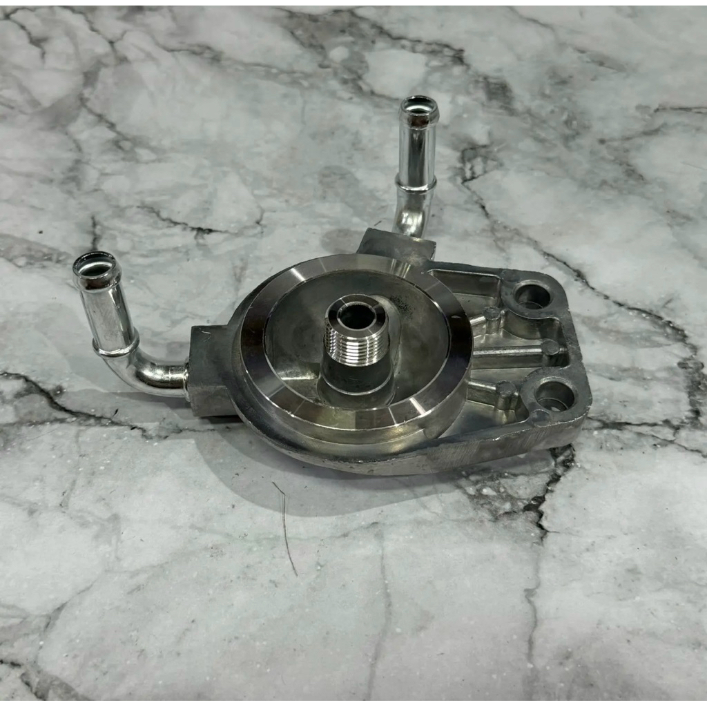 BRACKET COVER FUEL FILTER RUMAH KEPALA SEDIMENTER FUEL ISUZU PANTHER 2.5 ELF NKR HNR 55