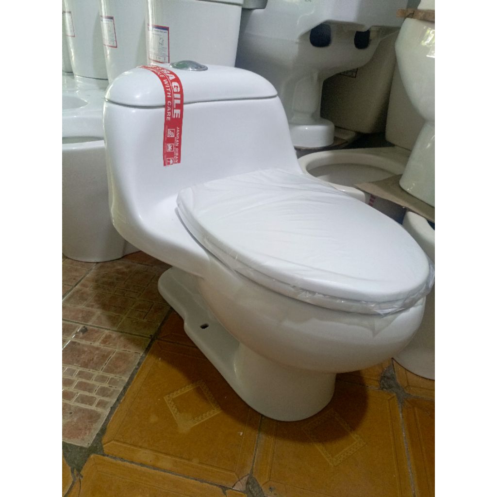 closed merk TOTO type CW894 J putih