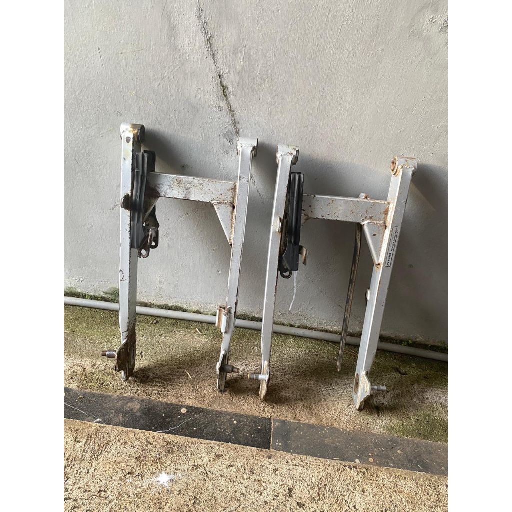swing arm karisma x dan supra 125 tromol original copotan.