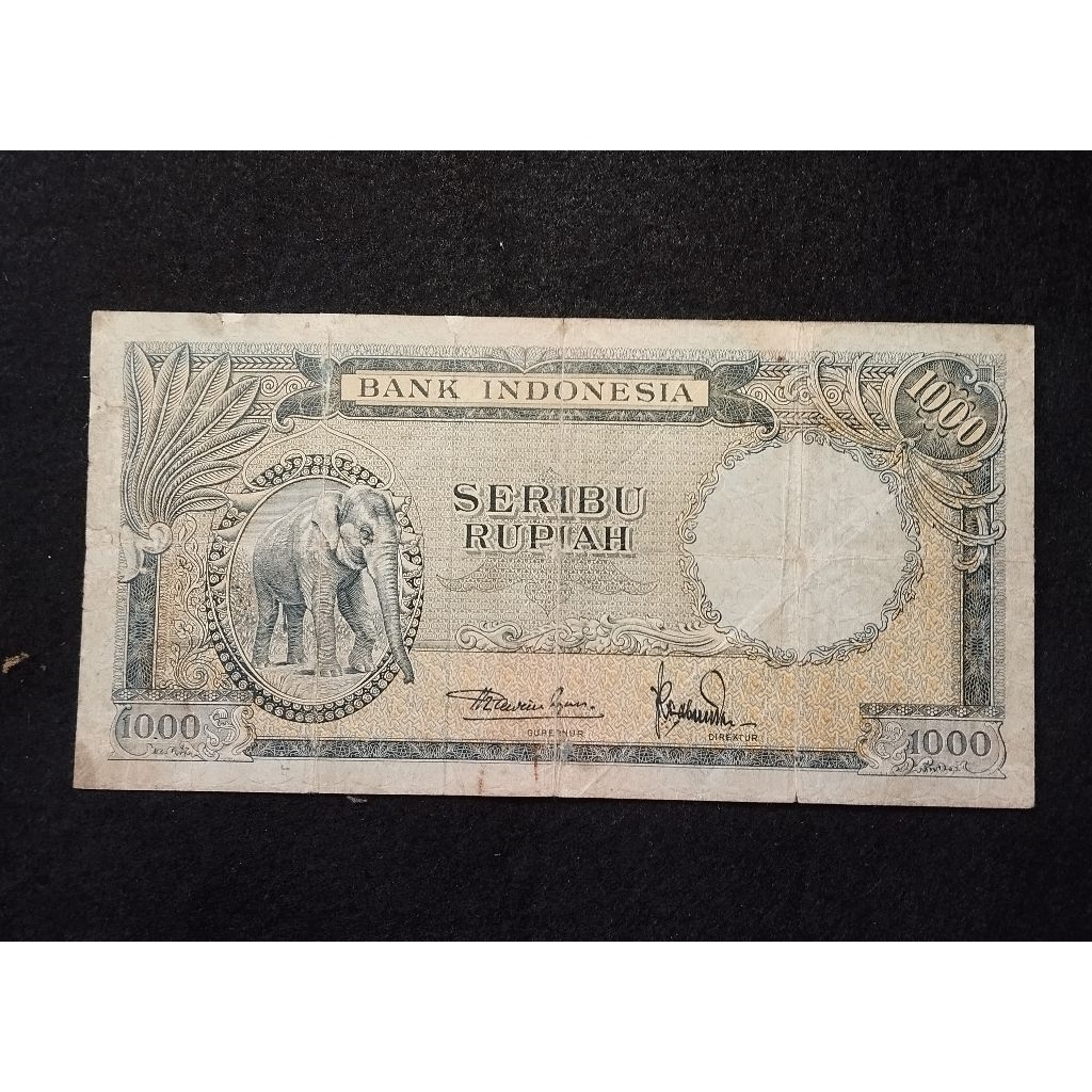 1000 rupiah seri hewan GAJAH bekas beredar  original sesuai foto