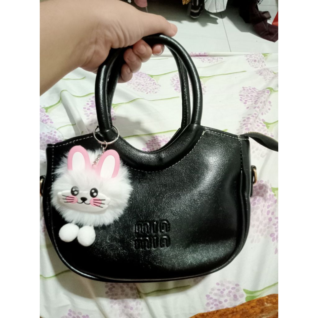 TAS MIU MIU