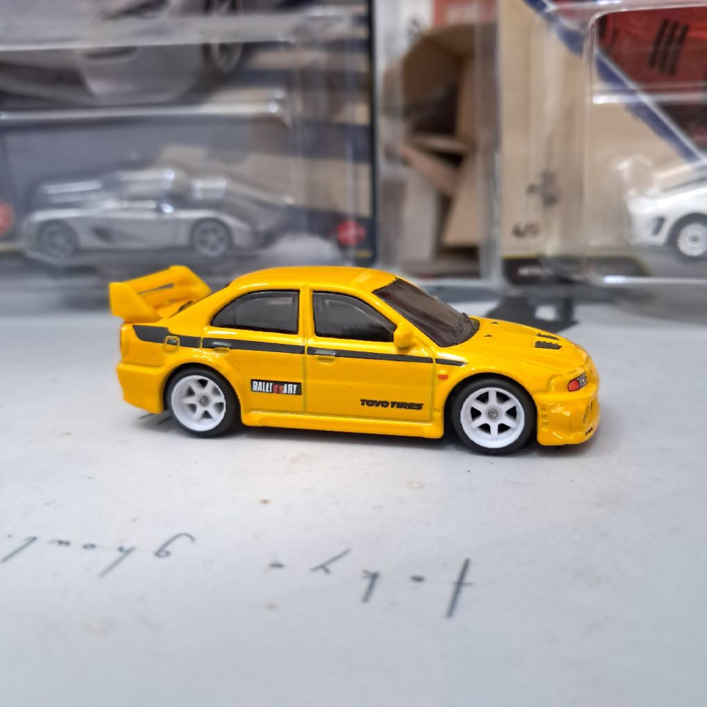 Hot wheels Mitsubishi Lancer evolution 6 90s street scene- Hot wheels Mitsubishi Lancer evo 6 street