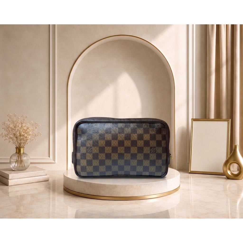 LV* Trousse Toilette Pouch Preloved