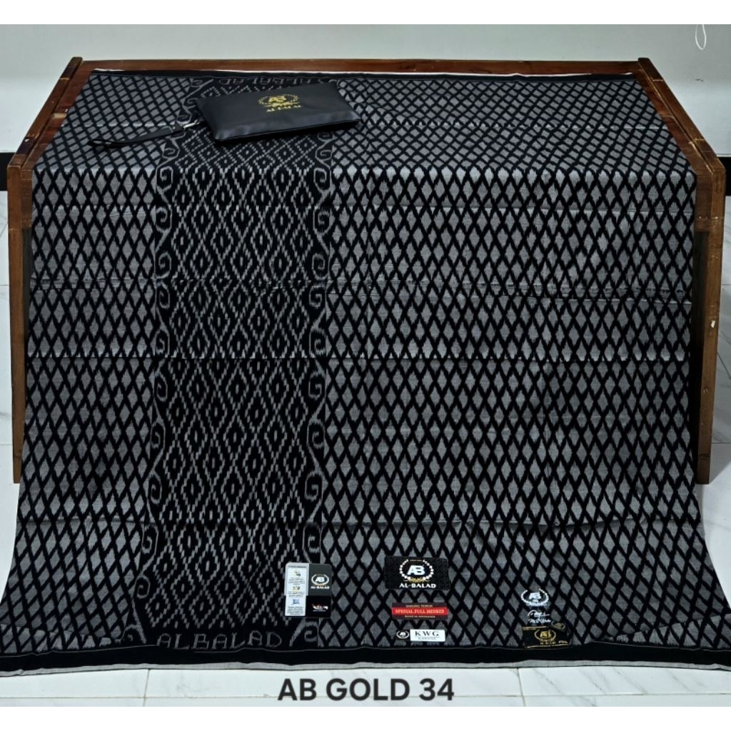 SARUNG AL BALAD/ALBALAD/AL -BALAD GRADE GOLD MOTIP KAWUNG/KWG BAHAN MESRES JAHIT TENGAH (DOMPET)