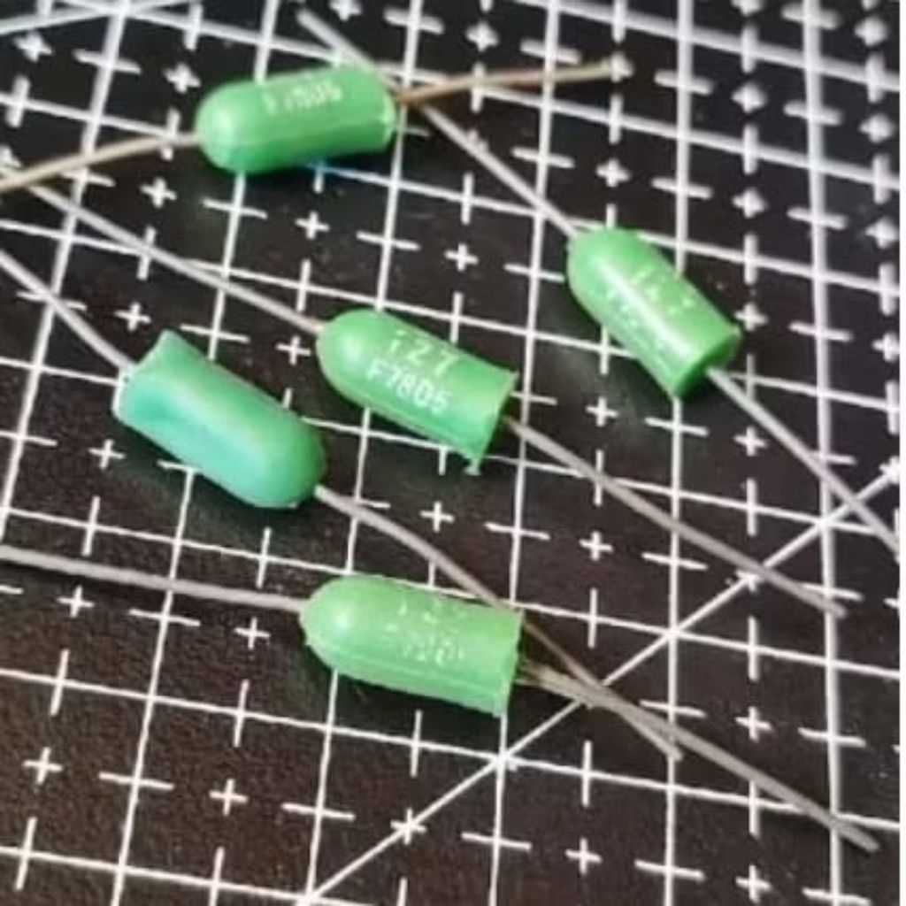 Kapasitor Film Plastik Axial 127