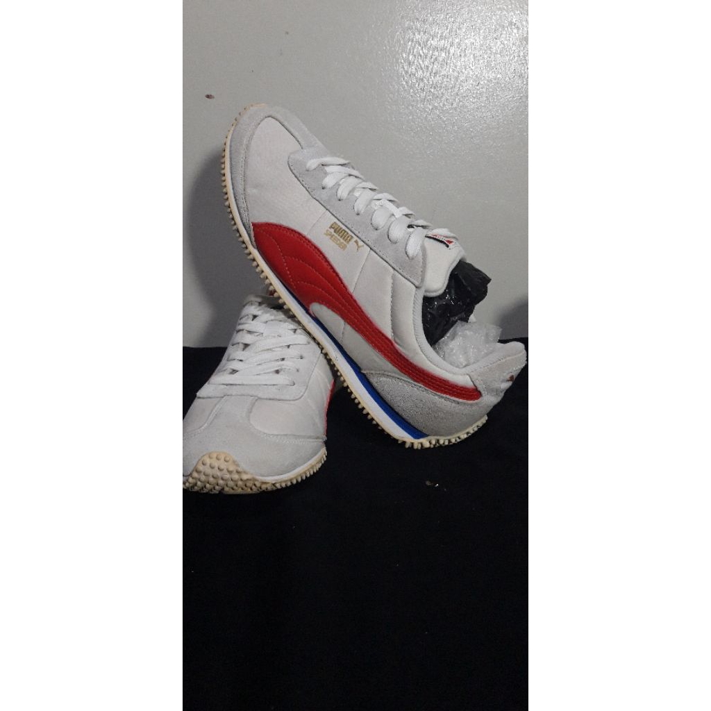 Jual sepatu running, santai, casual brand Puma Speeder SD warna white high risk red , like new size 