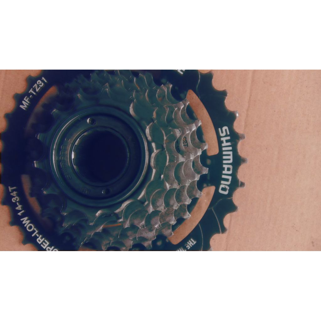 Freewheel Shimano 7 speed Original MF-TZ31 MEGARANGE 14-34T drat ulir Second