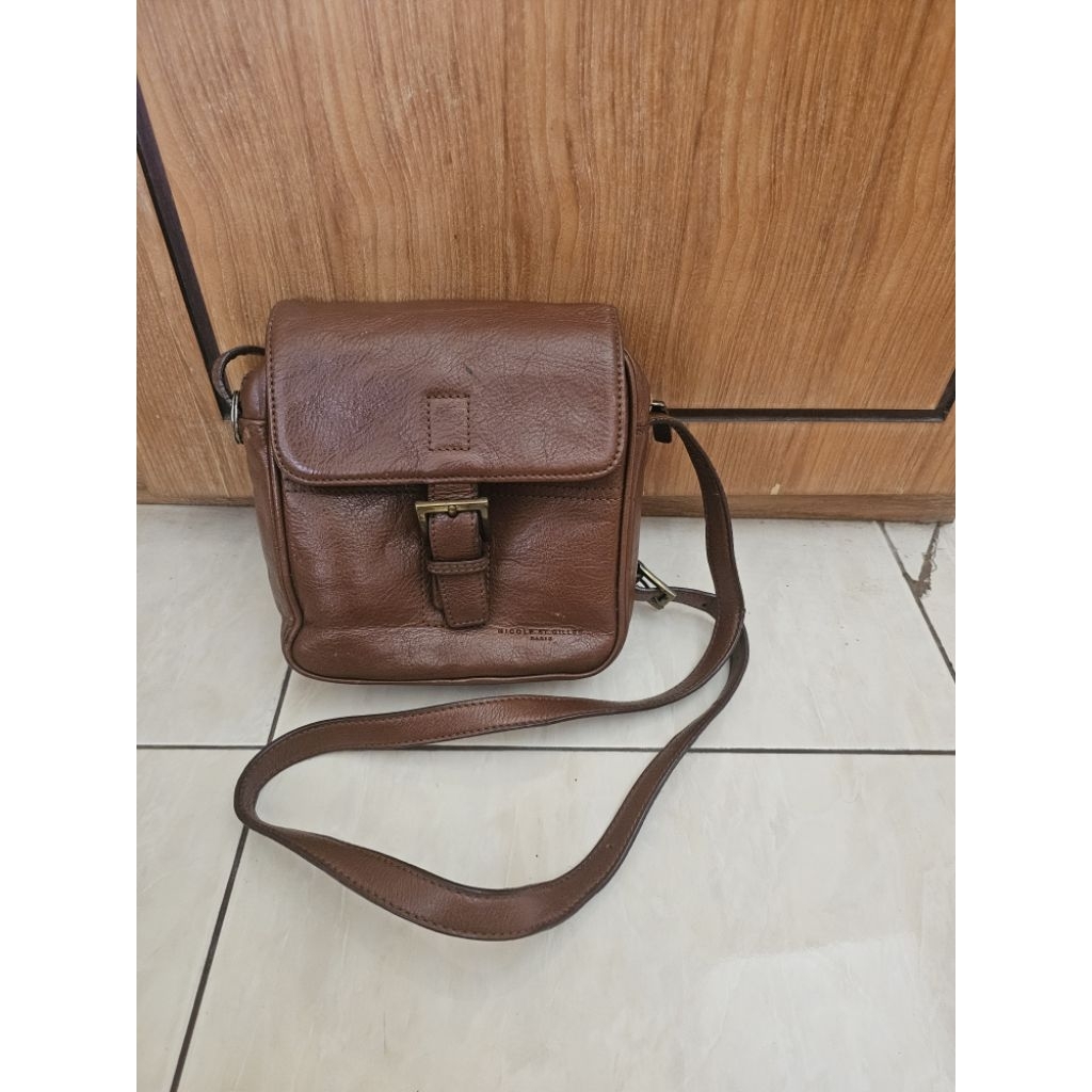 Preloved sling bag Nicole Miller