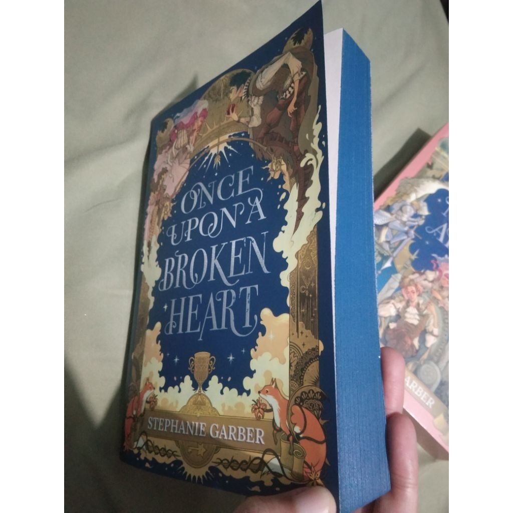 Once Upon A Broken Heart (preloved) dan The Ballad of Never After (sealed)