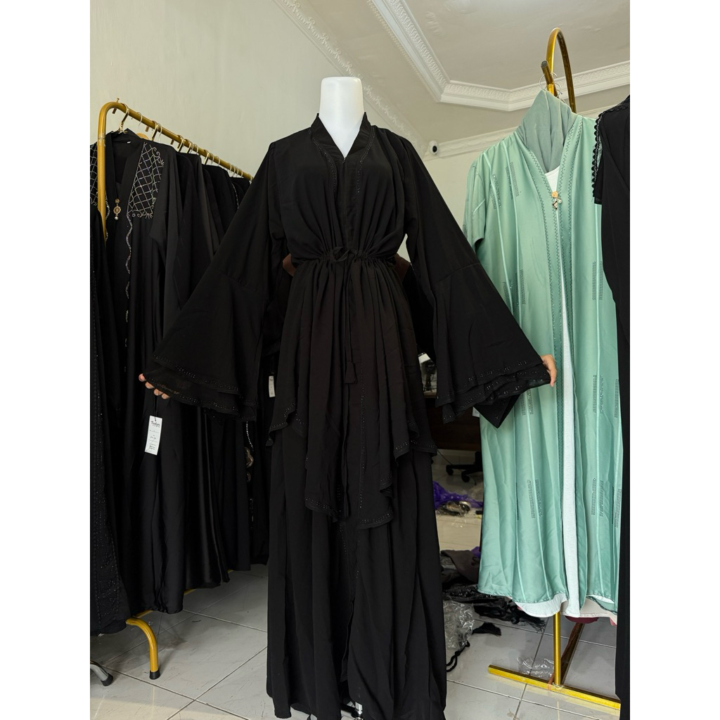 Hikmat abaya. abaya hitam simpel mewah