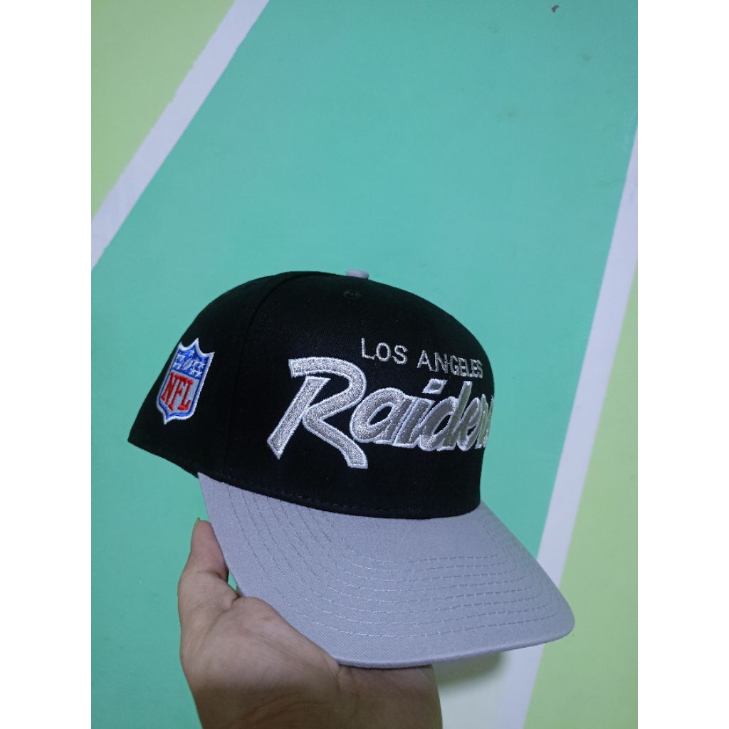 Topi Snapback Raiders Script
