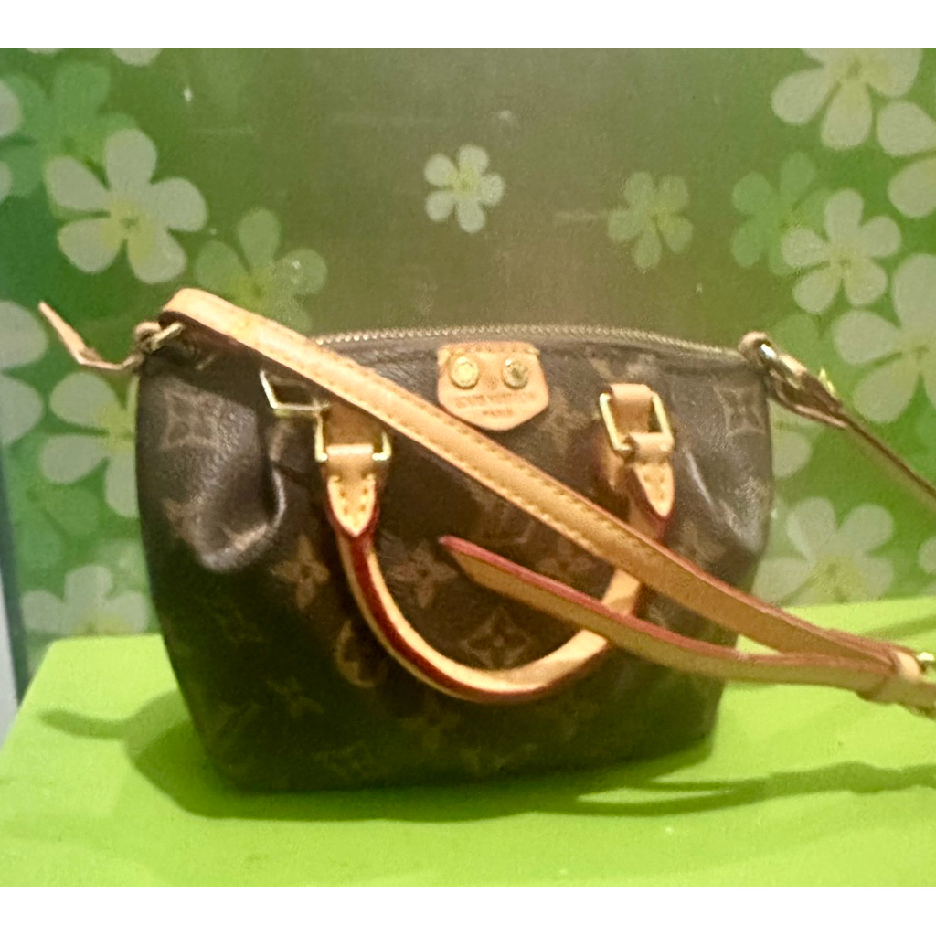 pre-owned Louis Vuitton Nano Turenne crossbody bag featuring the brand's iconic Monogram canvas and 