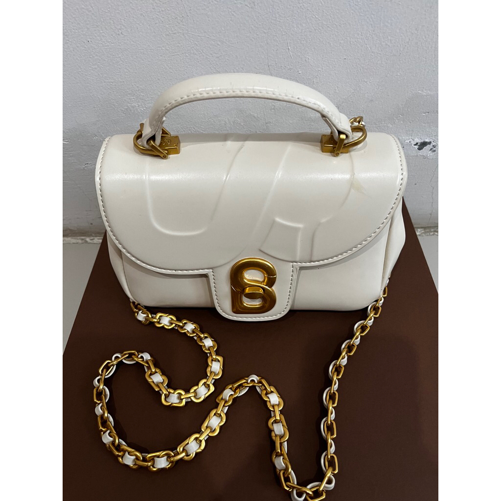 Buttonscarves alma flap bag