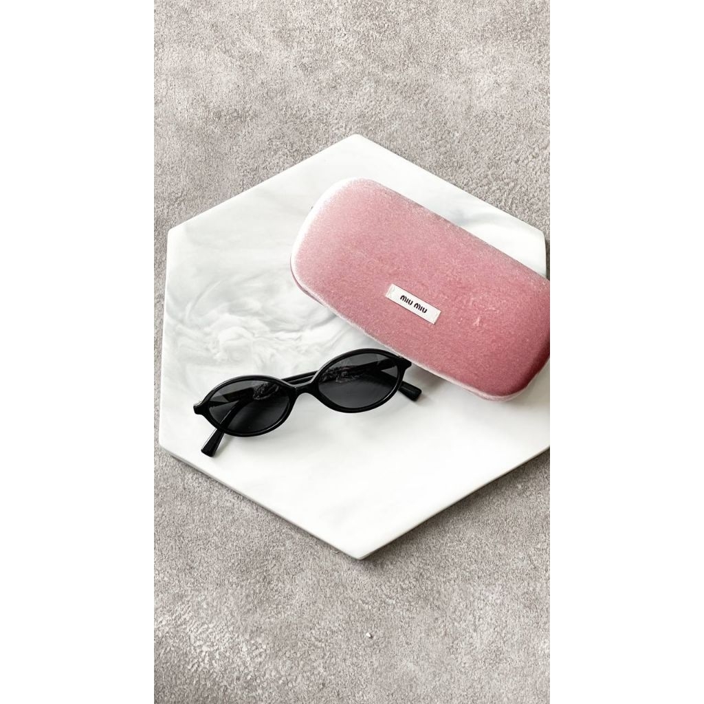 Miu Miu Regard Oval Sunglasses