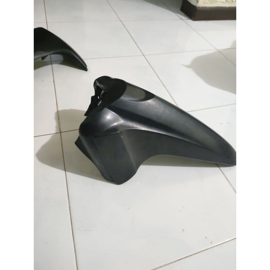 slebor depan supra X 125 original second