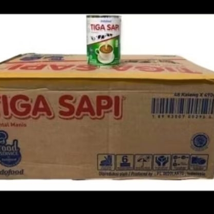 Tiga sapi SKM perkarton 48 kaleng x 490g