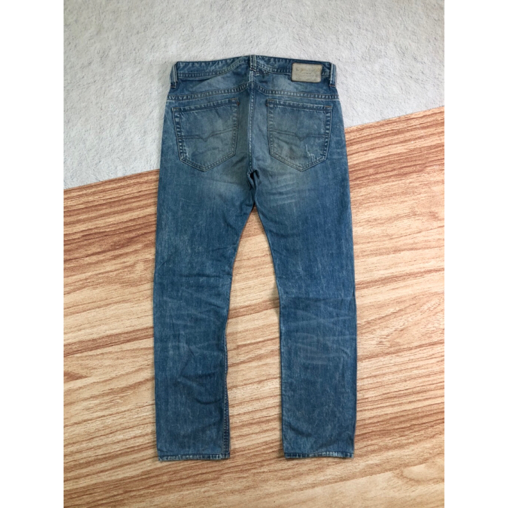DIESEL INDUSTRY RIPPED DENIM PANTS