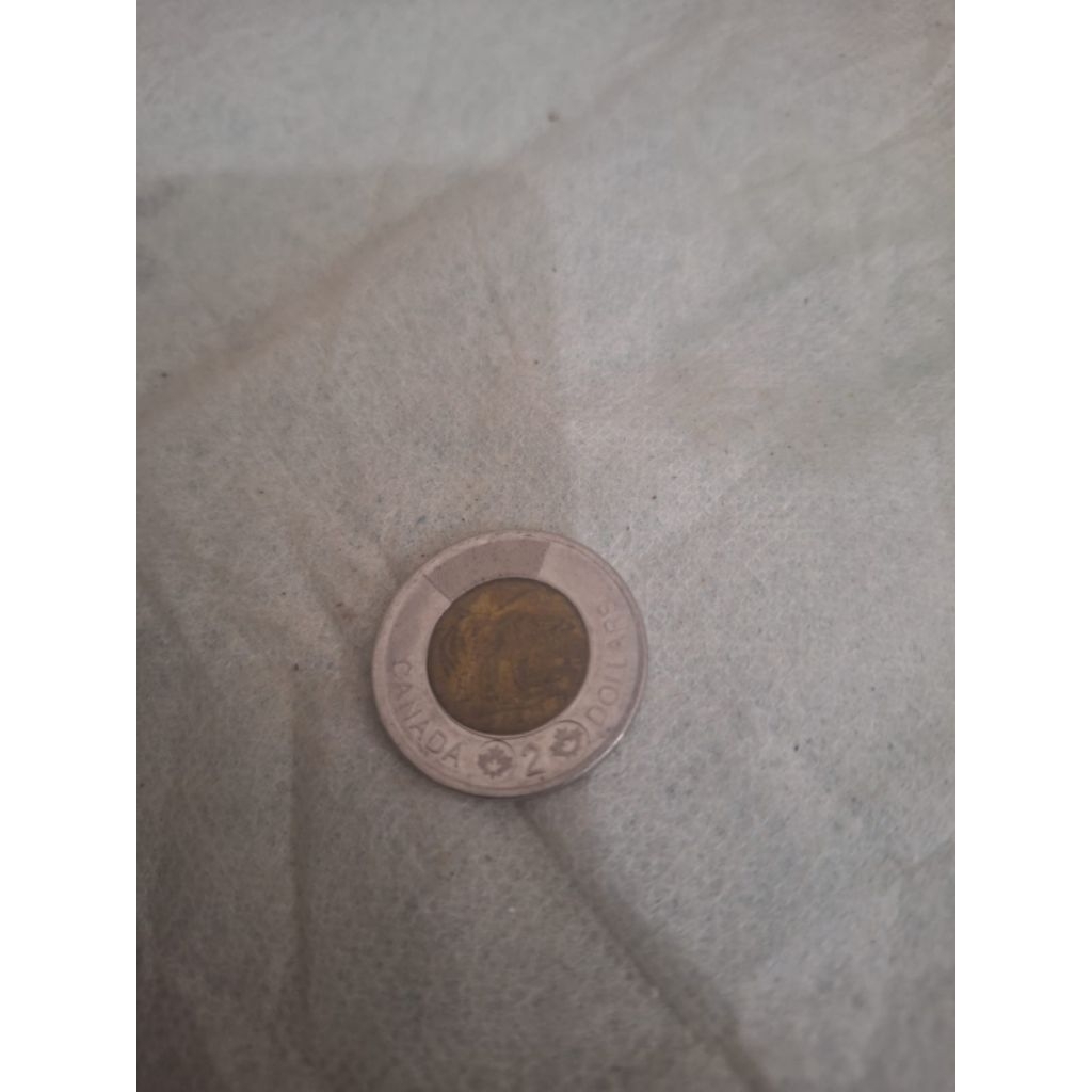 Koin 2 dollar atau tonnie Koin asli dari canada 
Limited edition 
Barang terawat 
Pemakaian pribadi