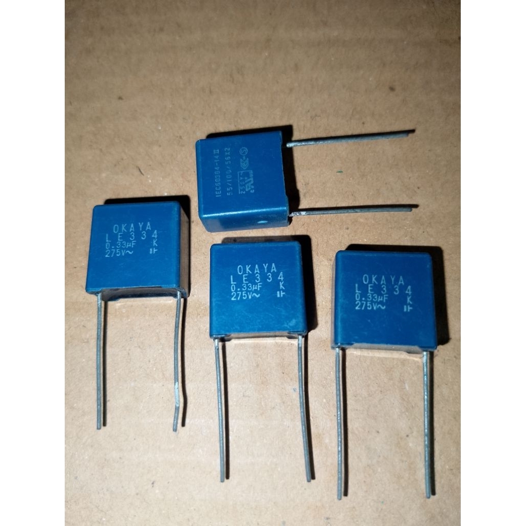 KAPASITOR OKAYA 0.33UF 275V JARAK KAKI 1.5CM
