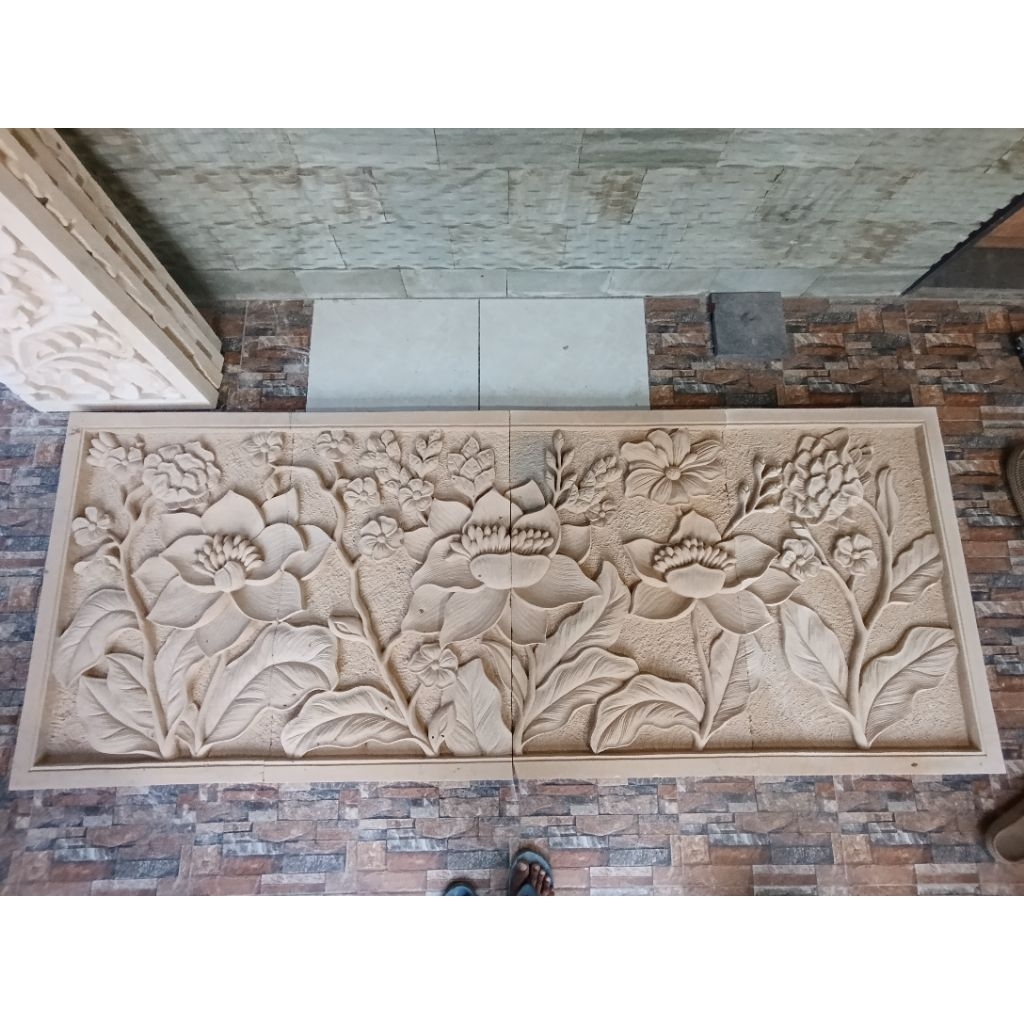 relief batu paras jogja motif bunga