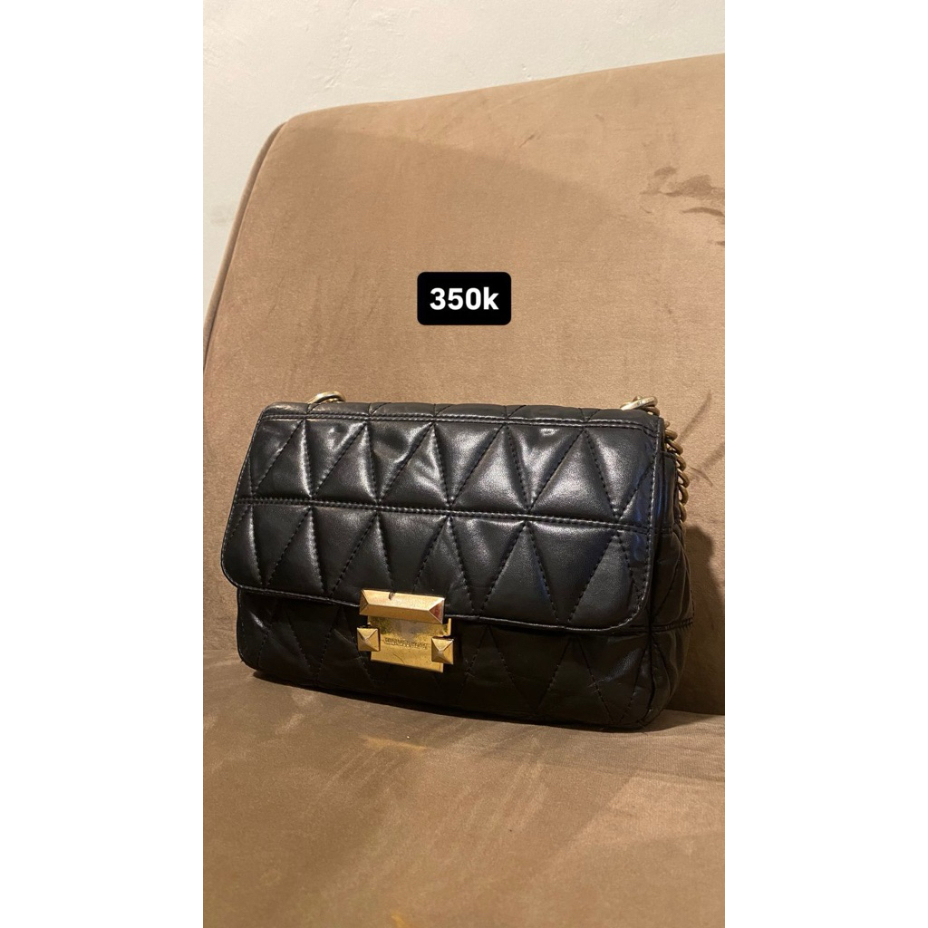 mk sloan hitam