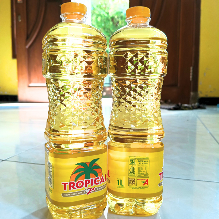 Tropical 1 liter kemasan botol/D'mora 1 liter bening